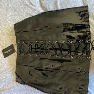 Black vinyl lace up skirt